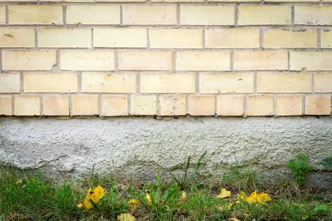 Yellow brick wall background Stock Photos