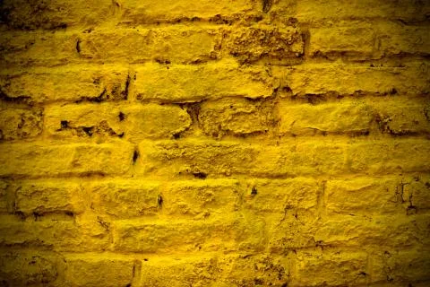 Yellow brick wall Stock Photos