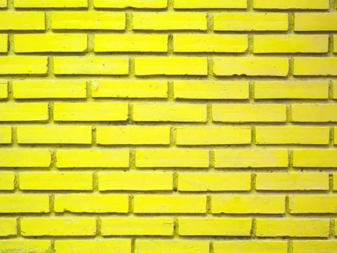 Yellow brick wall texture background Foto stock