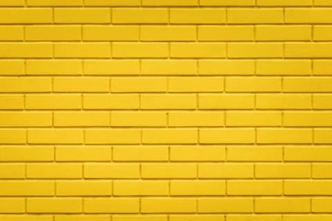 Yellow brick wall texture background, horizontal pattern Stock Photos