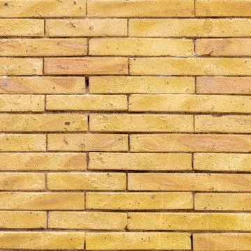 Yellow Brick wall texture background Stock Photos