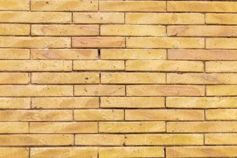 Yellow Brick wall texture background Foto stock