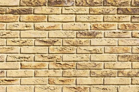 Yellow brick wall texture background seamless horizontal masonry pattern Stock Photos