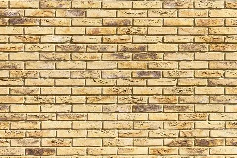 Yellow brick wall texture background seamless horizontal masonry pattern Stock Photos