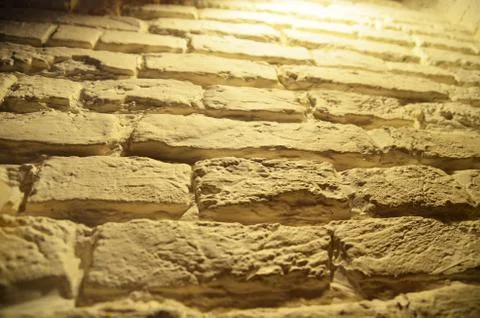 Yellow brick wall texture Stock Photos