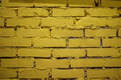 Yellow brick wall texture Stock Photos