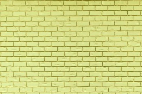 Yellow brick wall for use as a background. Stock Photos