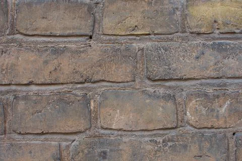 Yellow brick wall. Wall texture, background. Stock photo for wallpaper or tex Stock Photos