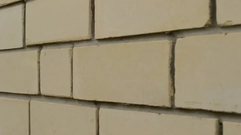 Yellow brick wall,shot from right to left. Stock Footage 141109251