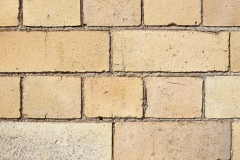 Yellow bricks and mortar Stock Photos