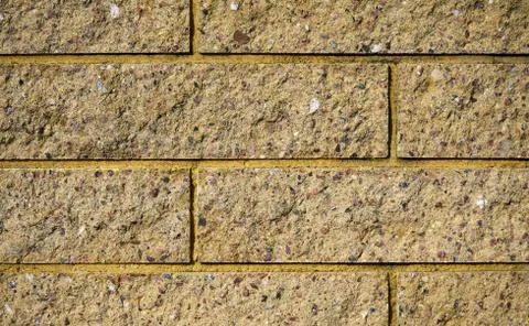 Yellow bricks wall. Bricks texure. Brick background Stock Photos