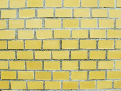 Yellow brickstone wall Stock Photos