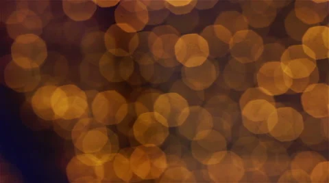Yellow brown bokeh lights moving in a slow and calm way Stock Footage 52265020
