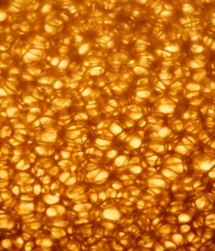 Yellow, brown cellular structure  polyurethane,  red-hot, metal Stock Photos