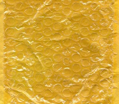 Yellow bubble wrap texture background Yellow bubble wrap texture useful as... Stock Photos