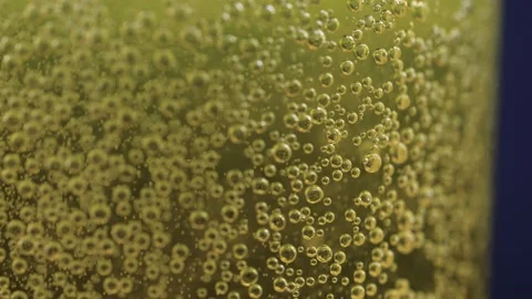 Yellow bubbles on the wall of the glass when the tablet is dissolved Video stock 172344490