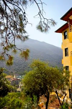 Yellow building and views of the mountain Stock Photos