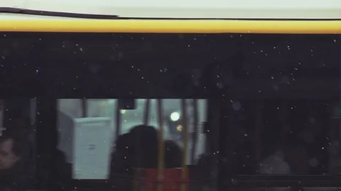 Yellow Bus Full of People Moving From Right to Left Stock Footage 79322423