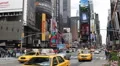 Yellow Cab Taxi Passing Street Times Square Busy New York City Establishing Shot HD Footage