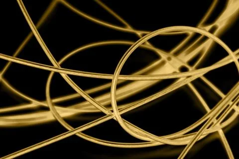 Yellow cable on the black background. The inversion Stock Photos