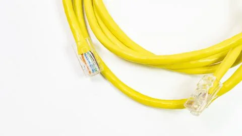 A yellow cable with a white background Stock Photos
