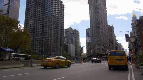 Yellow Cabs And Traffic Driving Up Iconic New York Street Stock Footage 113847874