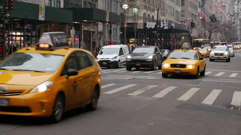 Yellow cabs driving in Manhattan Stock Footage 55555891