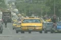Yellow cabs hailed on a busy street in Manhattan Footage