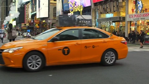 Yellow Cabs Passing at Time Square Stock Footage 75251649
