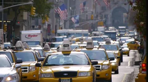 Yellow cabs taxi cars traffic in New York City Manhattan Park Avenue Stock Footage