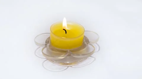 Yellow candle burning Stock Footage 47549189