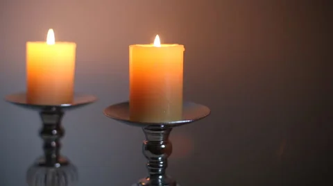 Yellow candles in candlestick Stock Footage 55268753