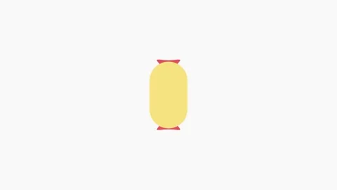 A yellow candy wrapped with a red bow, showcasing a festive and cheerful ap.. Stock Footage 333572021