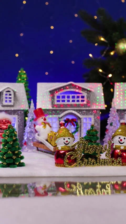 A yellow car drives through a beautiful Christmas town Stock Footage 340551349