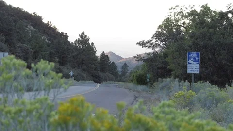 Yellow car going down the mountain in Hualapai State Park northern Arizona 스톡 동영상 80745780