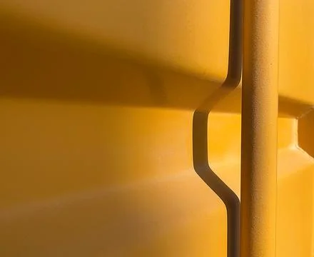 Yellow cargo sea container Stock Photos