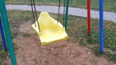 Yellow Carousel swinging Stock Footage 97802108