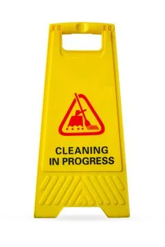 Yellow Caution cleaning in progress caution sign or slippery wet floor sign.. Stock Photos