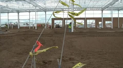 Yellow Caution Tape Blowing at Construction Site 스톡 동영상 12617212