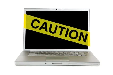 Yellow caution tape on a computer screen Stock Photos