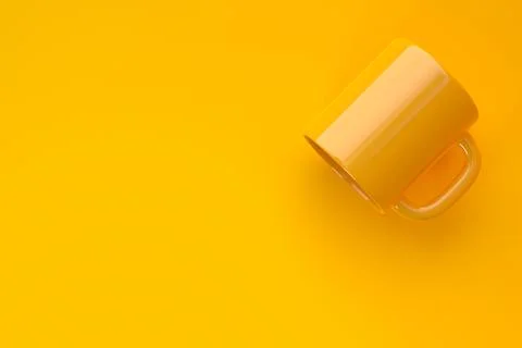 Yellow ceramic cup or empty mug for coffee, drink or tea on yellow background Stock Illustration