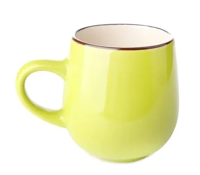 Yellow ceramic mug with rounded shape and handle Photos