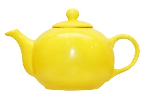 Yellow ceramic teapot.Isolated. Stock Photos