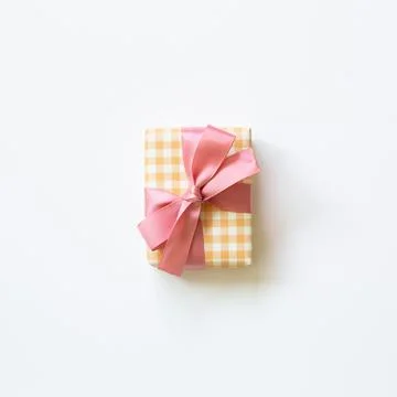 Yellow check pattern gift box isolated on white background Foto stock
