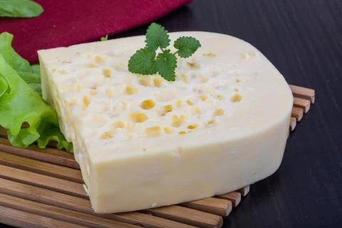 Yellow cheese Stock Photos