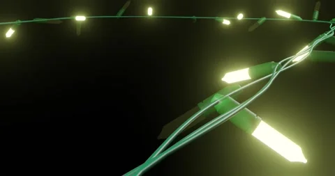 Yellow christmas string lights flashing on black background, copy space Stock Footage 253158454