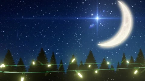 Yellow christmas string lights flashing over trees and crescent moon in night Stock Footage 310924838