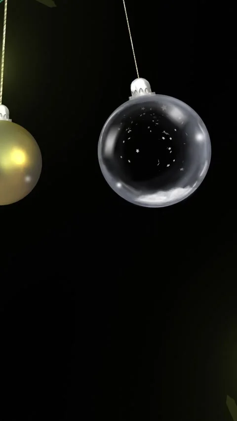 Yellow christmas string lights flashing over swinging gold and clear baubles on Stock Footage 343609809