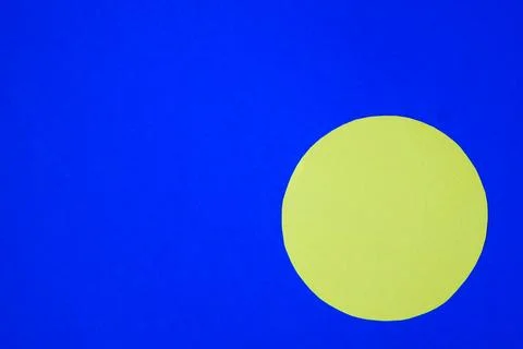 A yellow circle on a bright blue background. Space for the implementation of Illustrazione stock