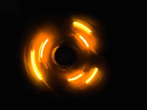 Yellow circle wave  in dark background Stock Photos